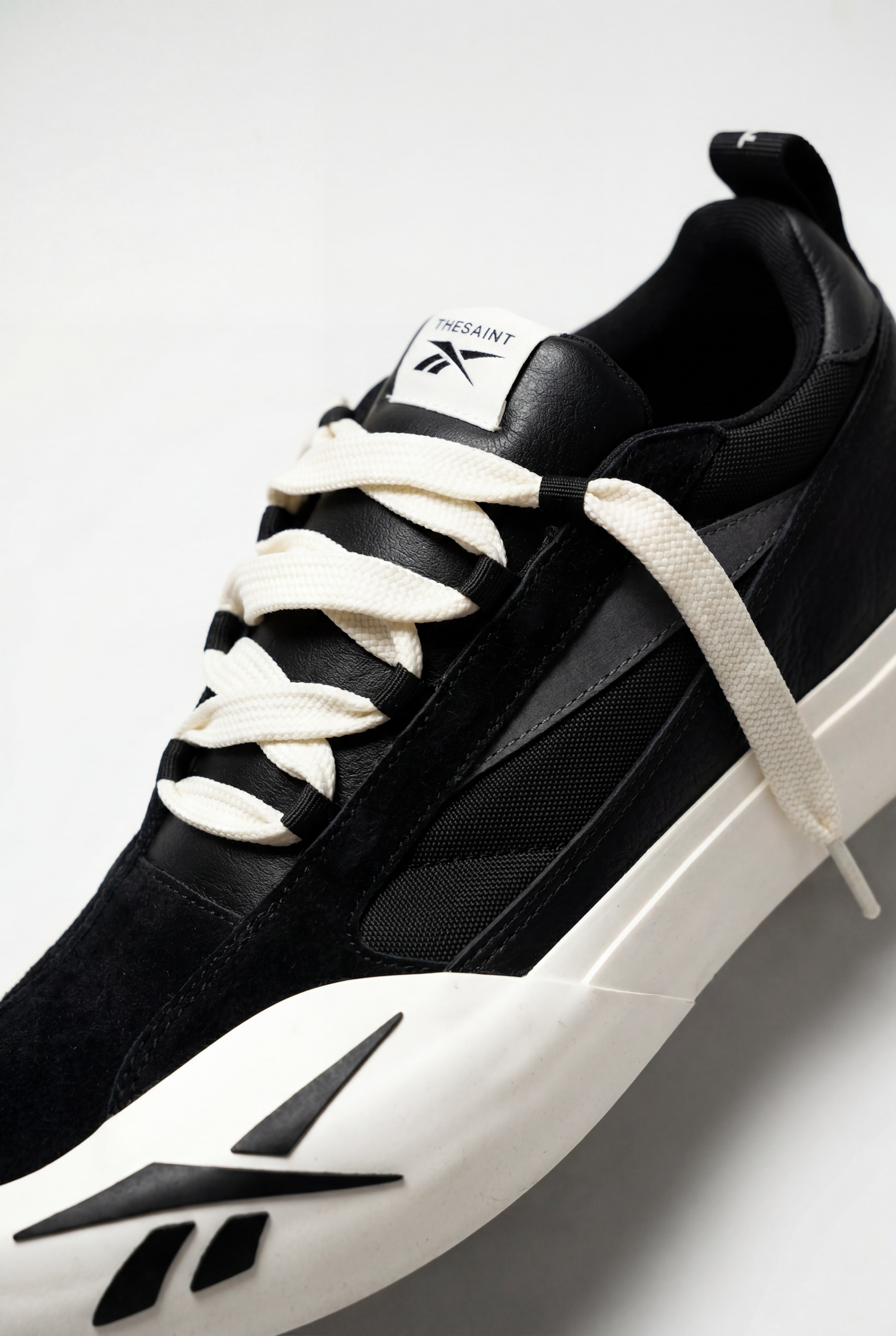 Tênis Reebok x THESAINT FTX-14