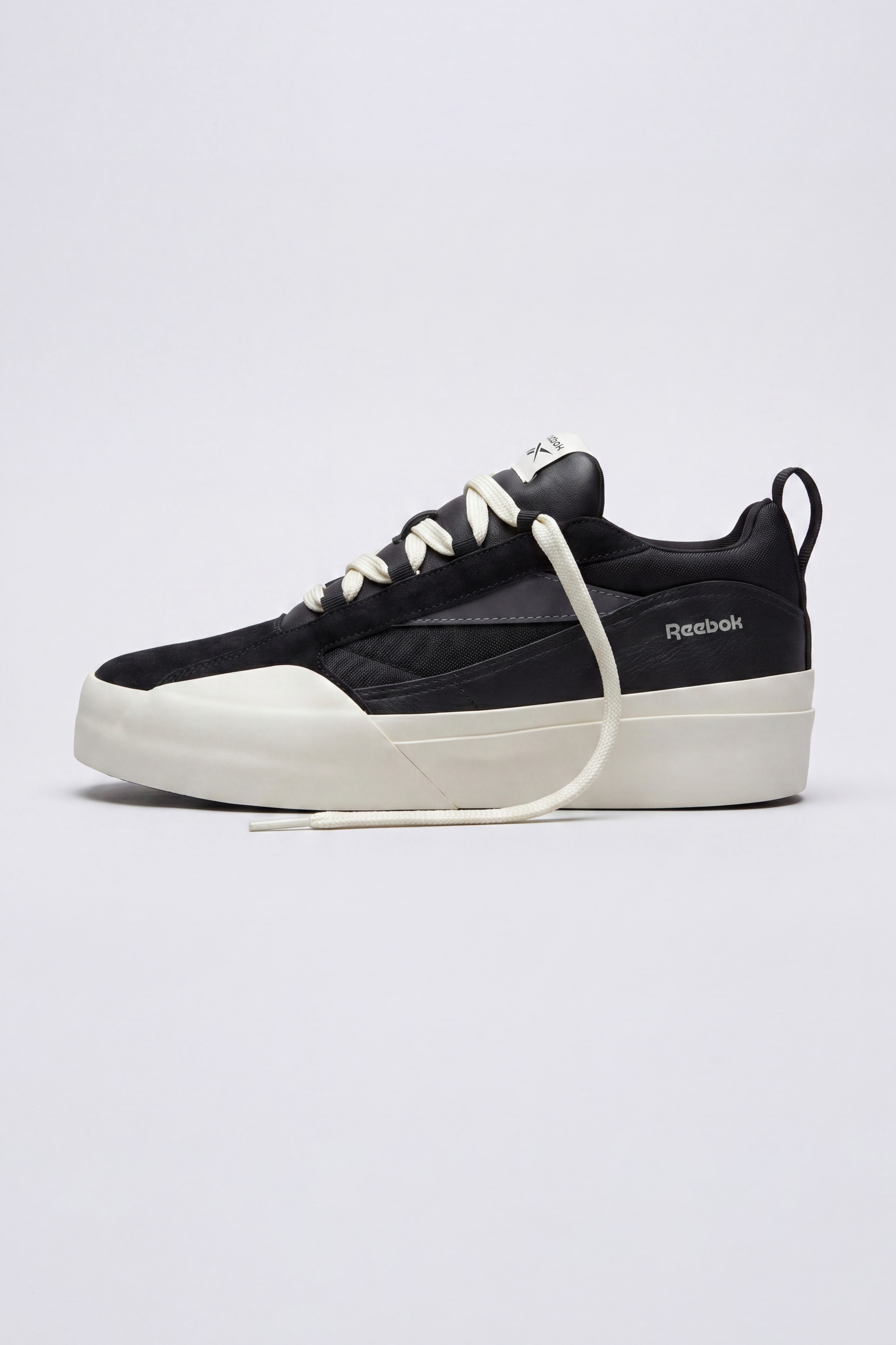 Tênis Reebok x THESAINT FTX-14