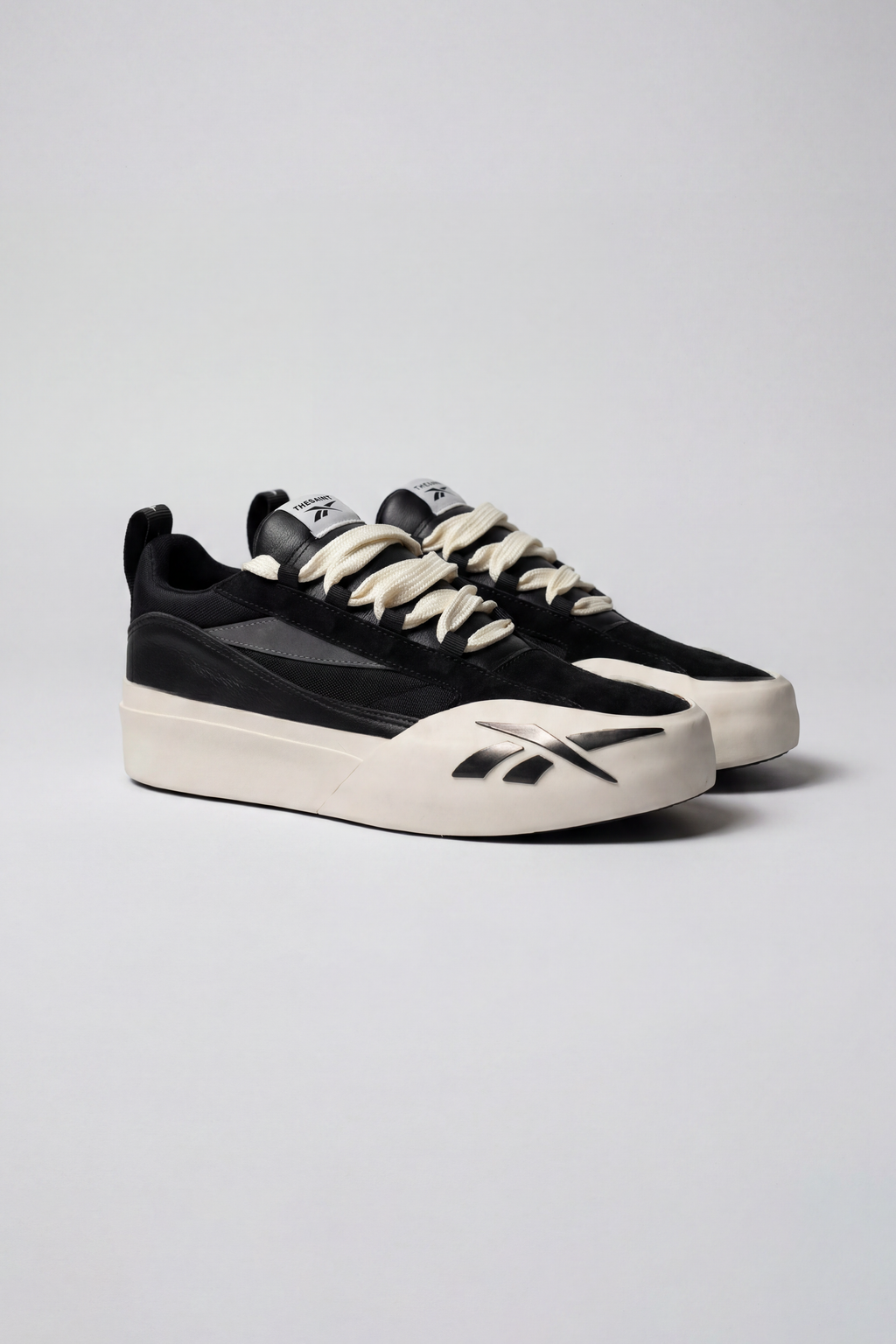 Tênis Reebok x THESAINT FTX-14